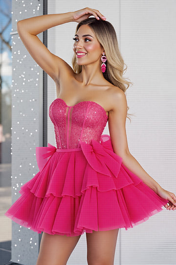 Robe courte de retour à la maison scintillante à paillettes fuchsia avec arcs